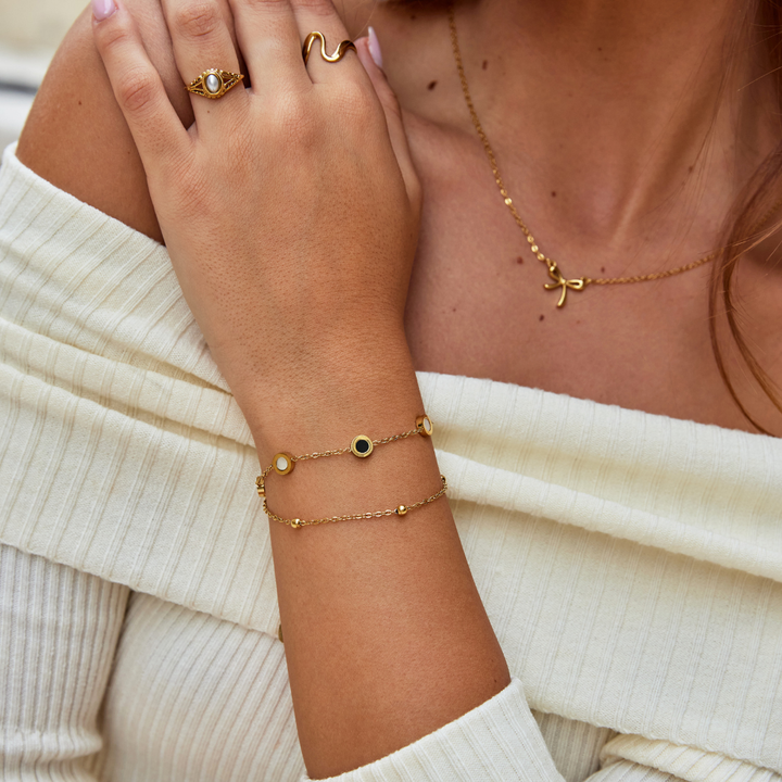 Onyx and white stone bracelet