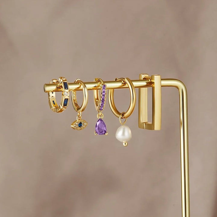 She eye drops earrings