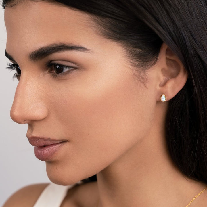 Golden teardrop gemstone earrings