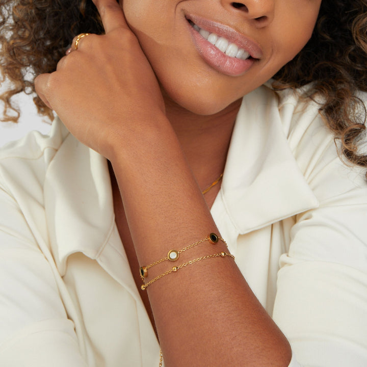 Onyx and white stone bracelet
